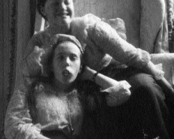 Grand Duchesses Maria and Anastasia making faces for the camera in Tsarskoye Selo, around 1917