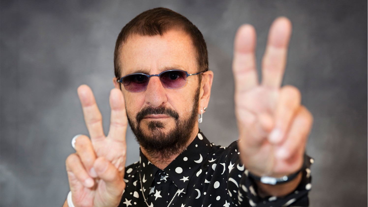 Ringo was naturally left-handed, but played on a right-handed drum set. His grandmother helped him become ambidextrous by teaching him how to write with his right hand as a schoolboy. #PeaceAndLove